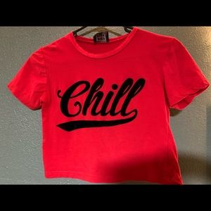 red cropped top with black logo